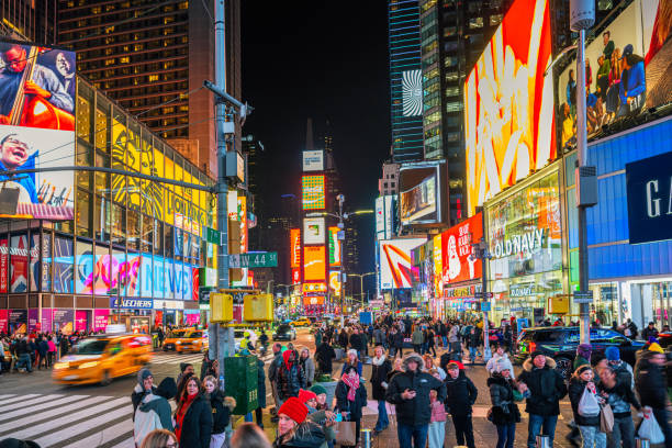 istock Vibrant Nightlife at Times Square Featuring Crowds and Illuminated Billboards 2192684178