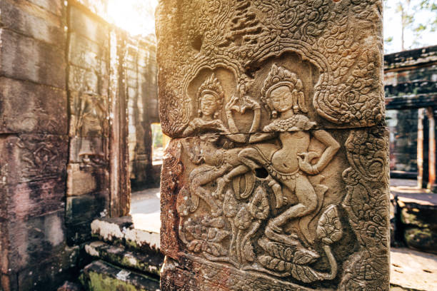 Stone reliefs depicting scenes of heaven and hell on the first gallery of Angkor Wat, Cambodia.