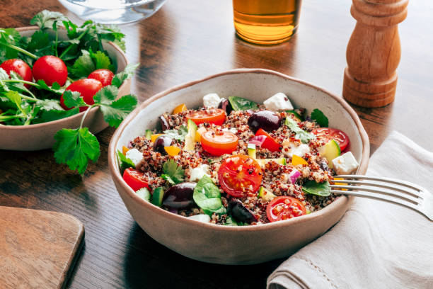 istock Quinoa salad, healthy Mediterranean lunch with fresh organic vegetables 2192685496