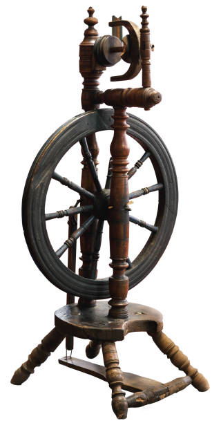 istock antique wooden spinning wheel, isolate 2192686300