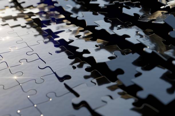 istock Jigsaw puzzle pieces fitting together one by one from left to right 2192687874