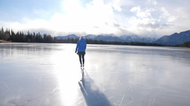 istock Woman skates on frozen pond 2192689974