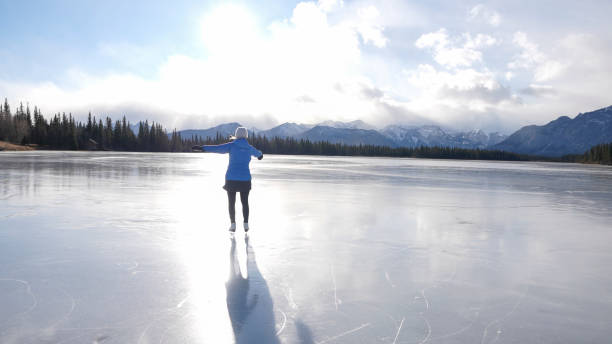 istock Woman skates on frozen pond 2192689989