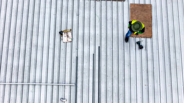 istock A sustainable energy project featuring solar panels on a roof surrounded by tropical trees, highlighting renewable energy efforts and the integration of green technology into rural areas. 2192694708