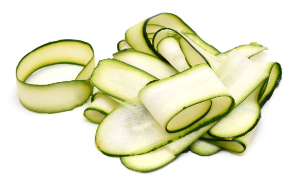 istock slices of green zucchini on white 2192695162