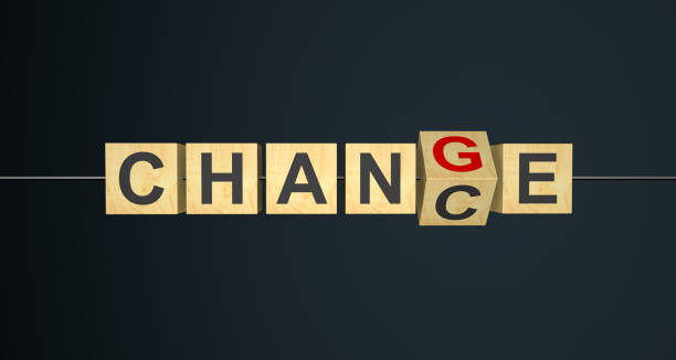 Business man hand flipping dice with CHANGE to CHANCE text on table background. Crisis, success, strategy, solution, business and Positive thinking concepts