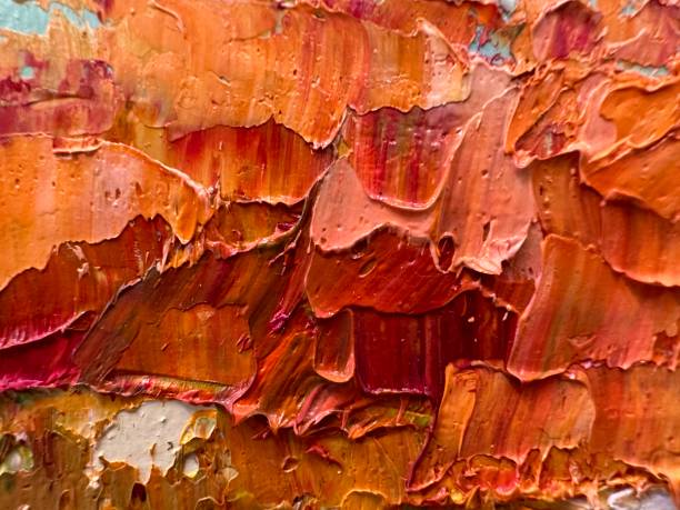 istock Large strokes of orange paint. 2192698481