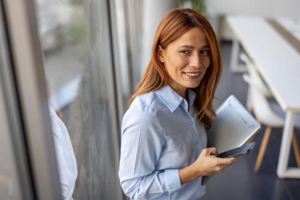 istock Confident businesswoman with technology in her hands 2192700053