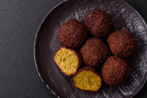 Fried chickpea falafel balls with salt, spices and herbs
