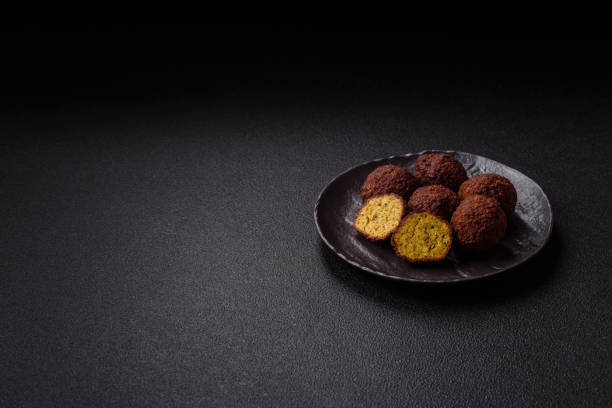 Fried chickpea falafel balls with salt, spices and herbs