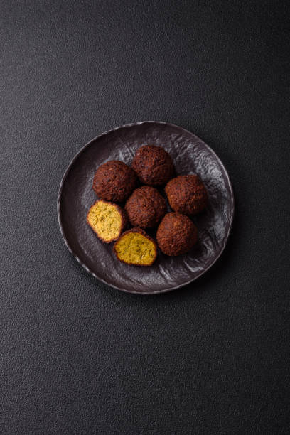 istock Fried chickpea falafel balls with salt, spices and herbs 2192702312