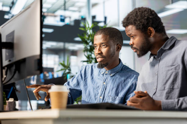 istock Financial advisor and colleague discussing resource allocations 2192703609