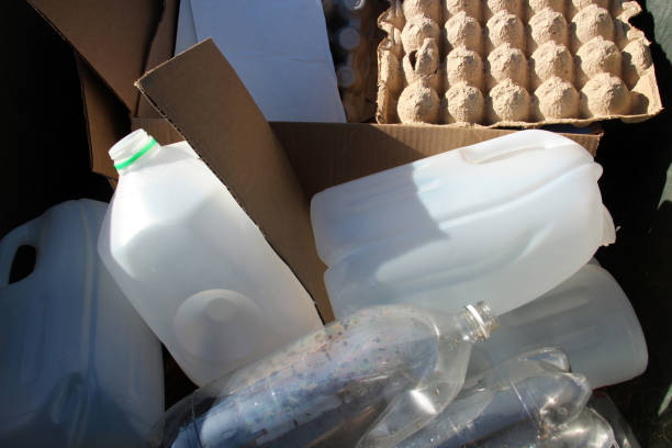 istock Recycling materials including plastic bottles, cartons, and cardboard in a bin. 2192704231