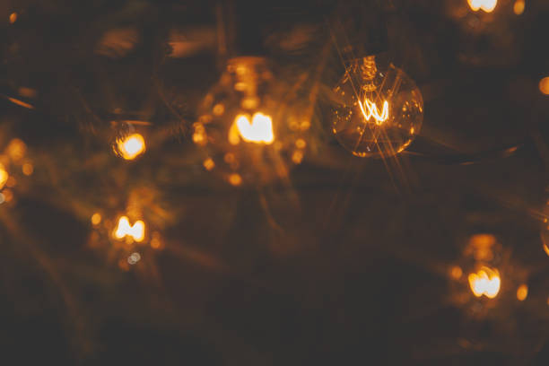istock Background - electric garland with incandescent bulbs, yellow warm light 2192704865