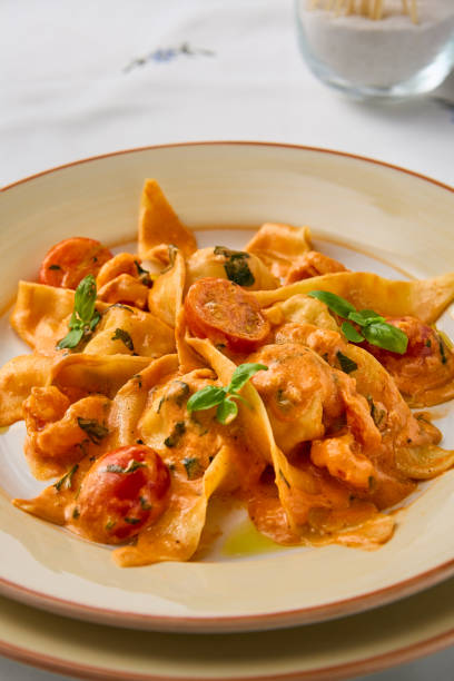istock Creamy Tomato Shrimp Pasta in Soft Natural Lighting 2192705453