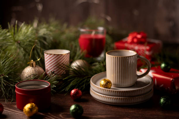 istock Serene Christmas Atmosphere with Festive Decor, Candles, and Elegant Dinnerware Set in a Cozy Holiday Setting to Enhance Celebration Spirit and Warm Family Gatherings 2192707772