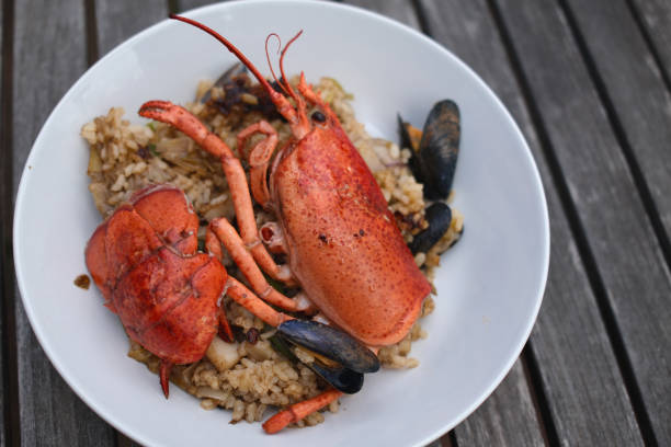 istock lobster and mussels seafood rice 2192708074