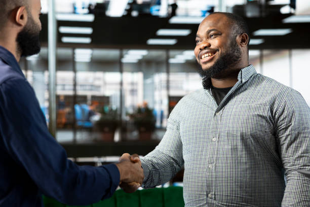 istock Happy executive board members shaking hands, reaching agreement 2192708626
