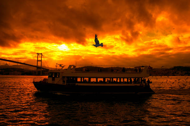 Tour boat sailing on the Bosphorus. Boat taking tourists on a tour on the Bosphorus.