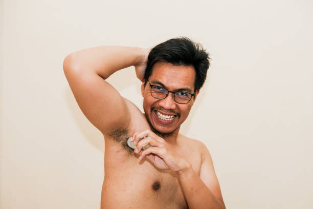 istock A shocked Southeast Asian man naked  using antiperspirant deodorant 2192714205