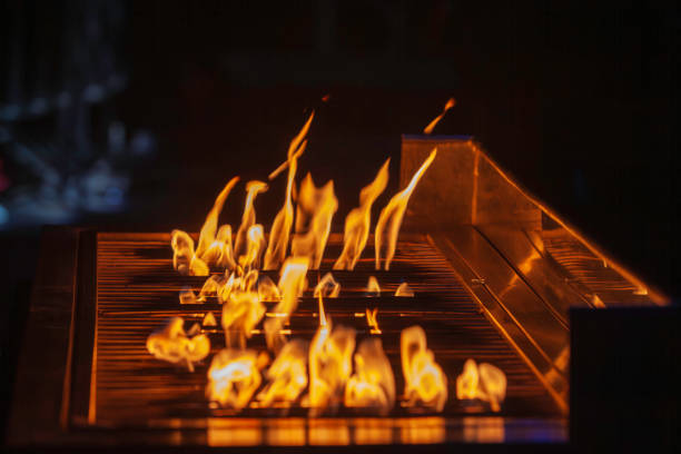 istock Vivid Flames on BBQ Grill with Intense Yellow Fire Up 2192715757