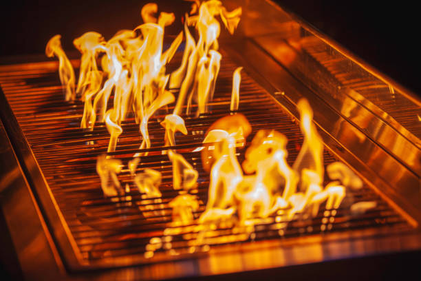 istock Vivid Flames on BBQ Grill with Intense Yellow Fire 2192715799