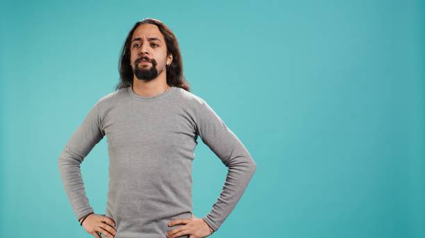 istock Portrait of man standing confidently with hands on hips 2192716341