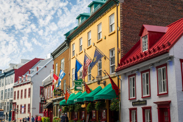 Quebec, Canada - October 4, 2024. Tourists walking on sidewalk in Old Town of Quebec City, Quebec, Canada