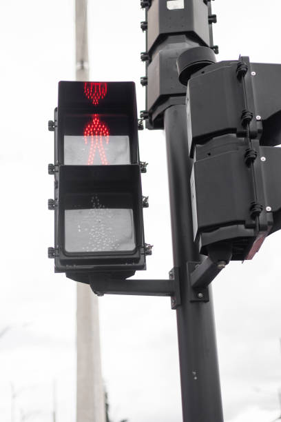 istock Red Pedestrian Traffic Light Signaling to Stop 2192725068