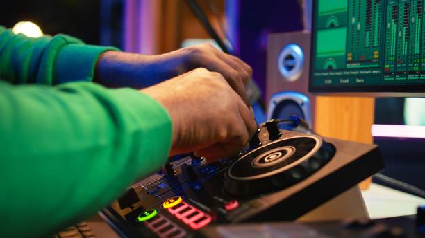 istock Audio engineer with headset mixing and mastering his recorded files 2192726733