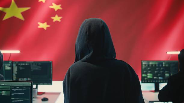 istock Terrorist person in a Chinese cyber security room hacking national systems 2192728624