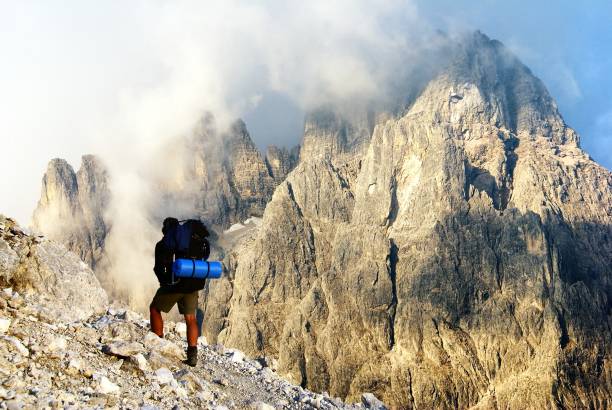 Dolomiti di Sesto and hiker, Alps Dolomites mountains, Italy