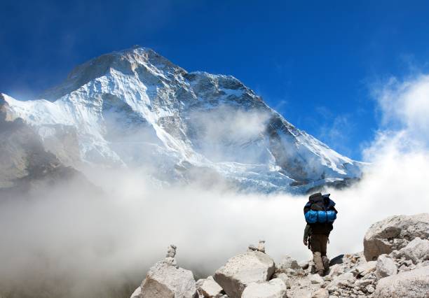 istock Mount Makalu with tourist and clouds 2192730329
