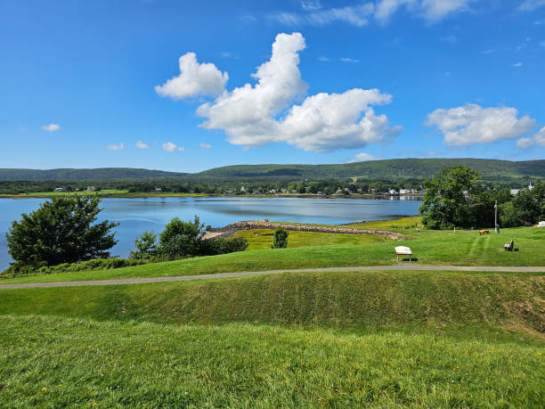 istock Large grassy area next to shore 2192730515