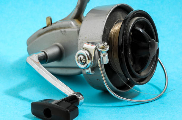 istock A fishing reel with a black handle and a silver body 2192730910