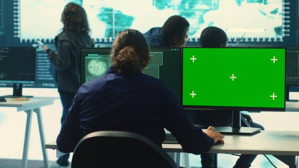 istock Hacking specialist works with an isolated chroma key display 2192731094