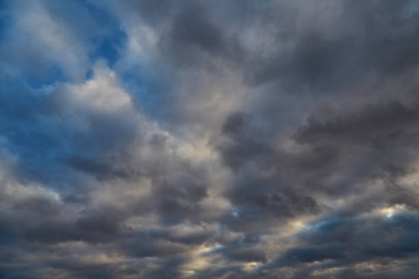 istock Blue winter sky with gray-white clouds after a snowfall. 2192737448
