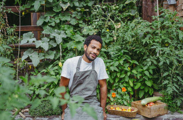 istock Joyful Diverse Gardener in Organic Garden 2192738124
