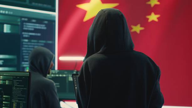 istock Chinese hacker working in governmental hacking room with Chinese flag 2192744242