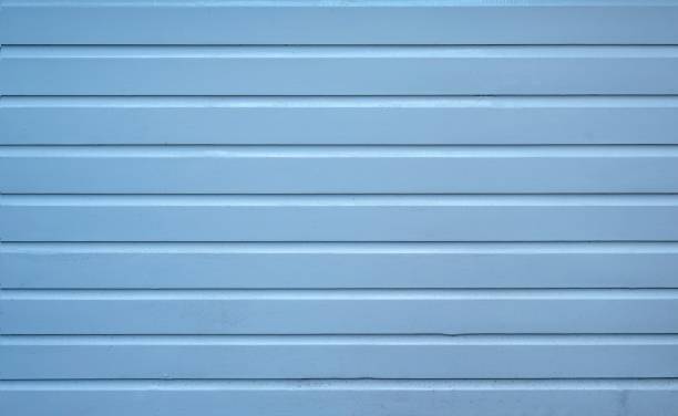 istock Closeup view of gray wall. Abstract pattern of a wall with horizontal ribbed lines 2192745182