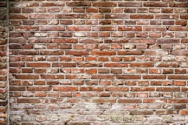 istock Closeup view of the red wall. Abstract pattern of a brick wall 2192745574