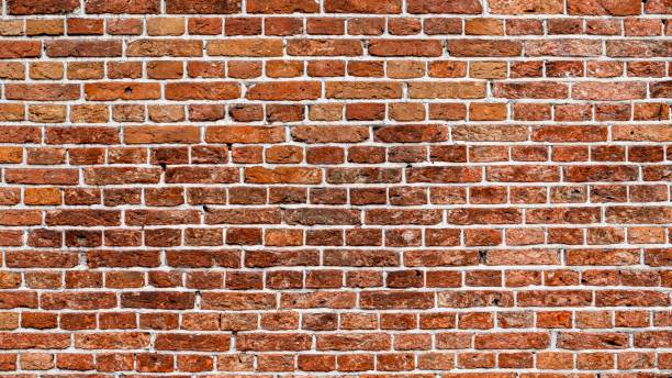 istock Closeup view of the red wall. Abstract pattern of a brick wall 2192745743