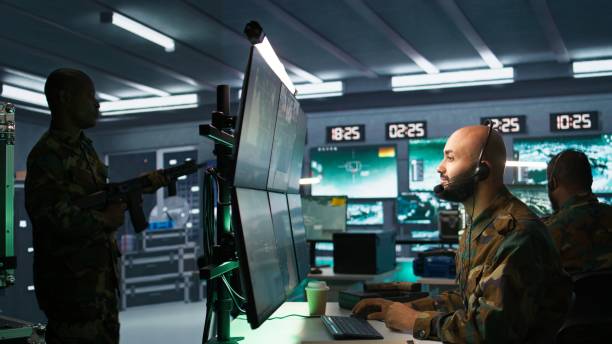 istock Army expert providing intel for troops, coordinating mission activities 2192746302