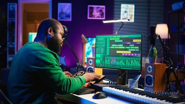 istock Skilled male composer producing new songs on his mixing console 2192749022