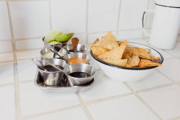istock Mexican tortilla chips with spicy sauces for dipping 2192749348