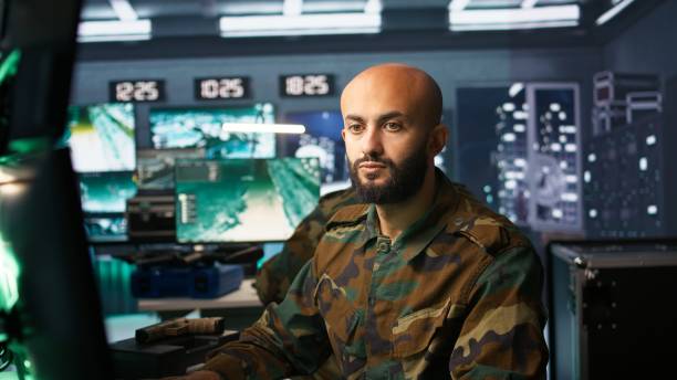 istock Military dispatcher managing communications networks, gathering intel 2192751738