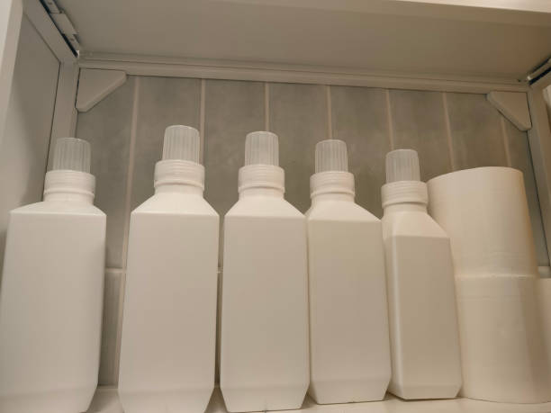 istock 5 white plastic bottles with a white cap on the shelf in an underground storage room, stock photo 2192752738