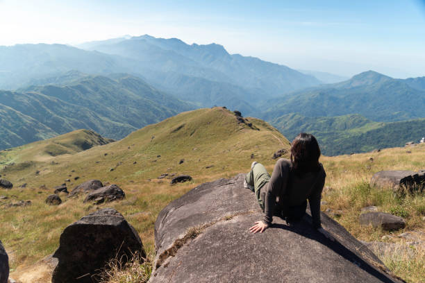 istock Hiker asian backpack walking trail activity camping outdoors and People exploring forest green natural capturing beauty nature outdoor. 2192754129