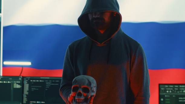 istock Russian cyber criminal making harmful death threats with a skull 2192754406