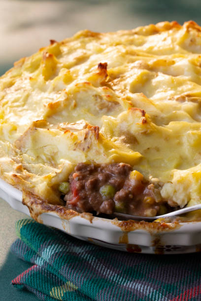 istock Homemade Shepard's Pie Cottage Pie, meat and vegetable pie covered in mashed potatoes 2192758416
